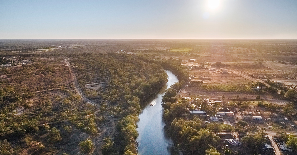 The Darling river winds into the sunset at Menindee