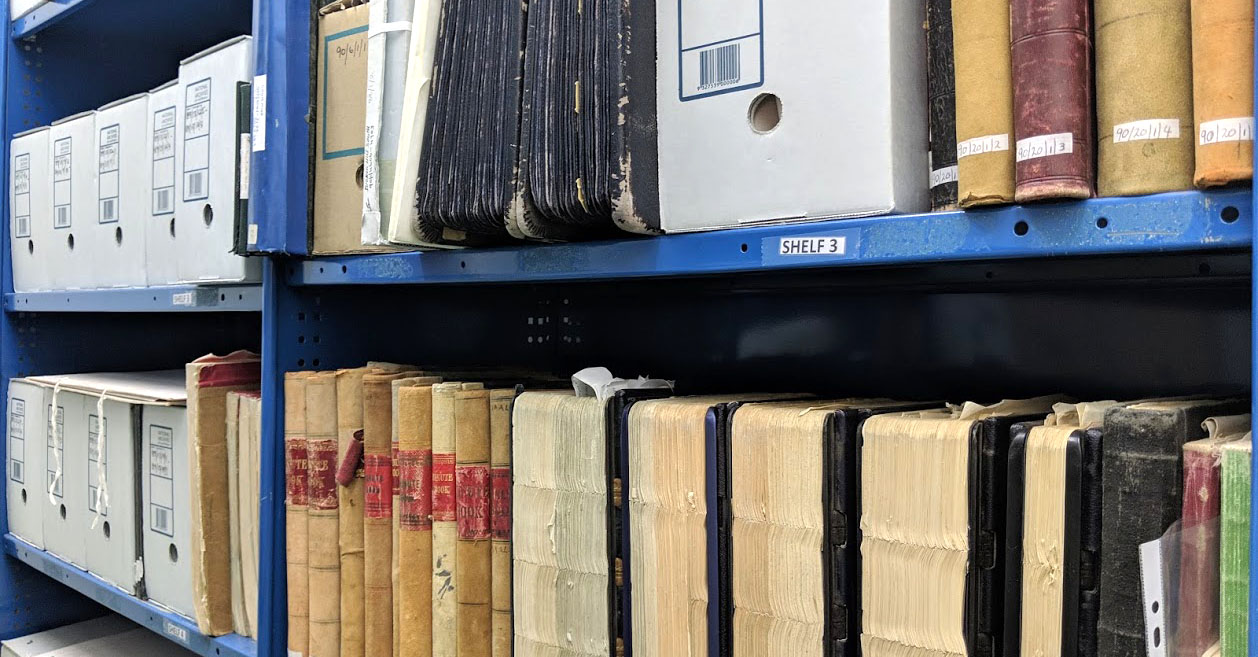 Shelves in the archives with old records