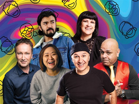 Six comedians standing in front of a rainbow swirl background that has smiling face outlines