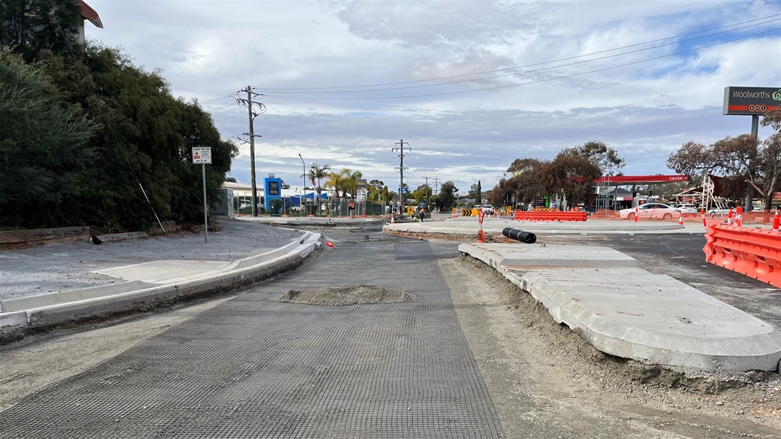 Image of roundabout construction taking place at an intersection.