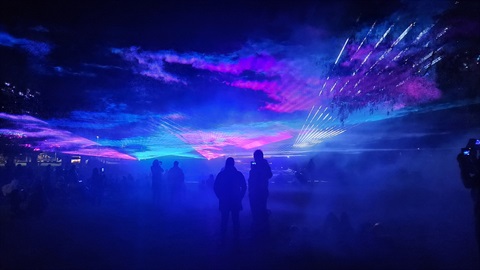 Coloured laser lighting in night sky