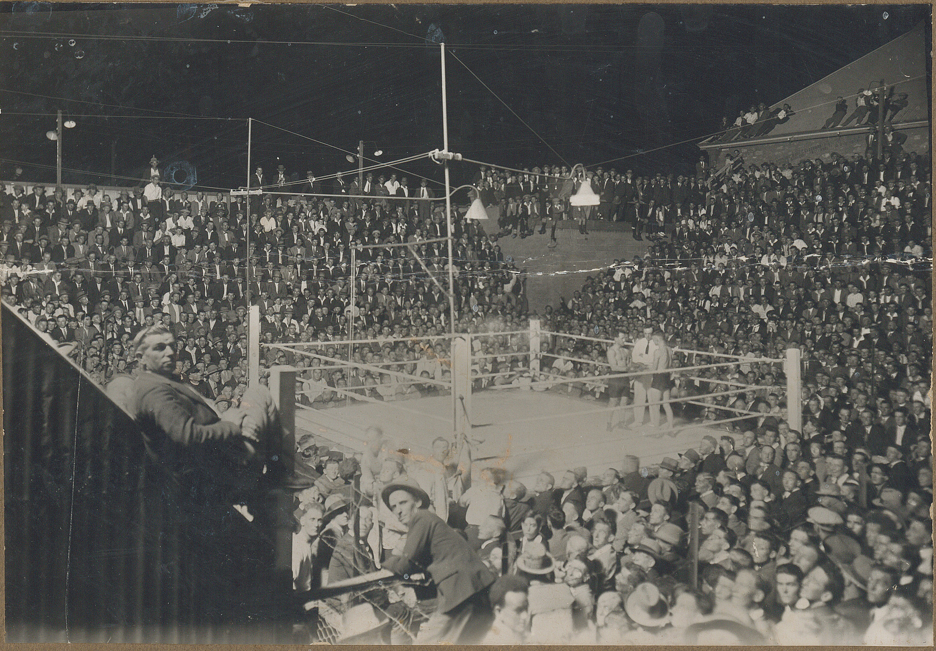 Boxing Stadium behind the Trades Hall in 1930 surround by crowd