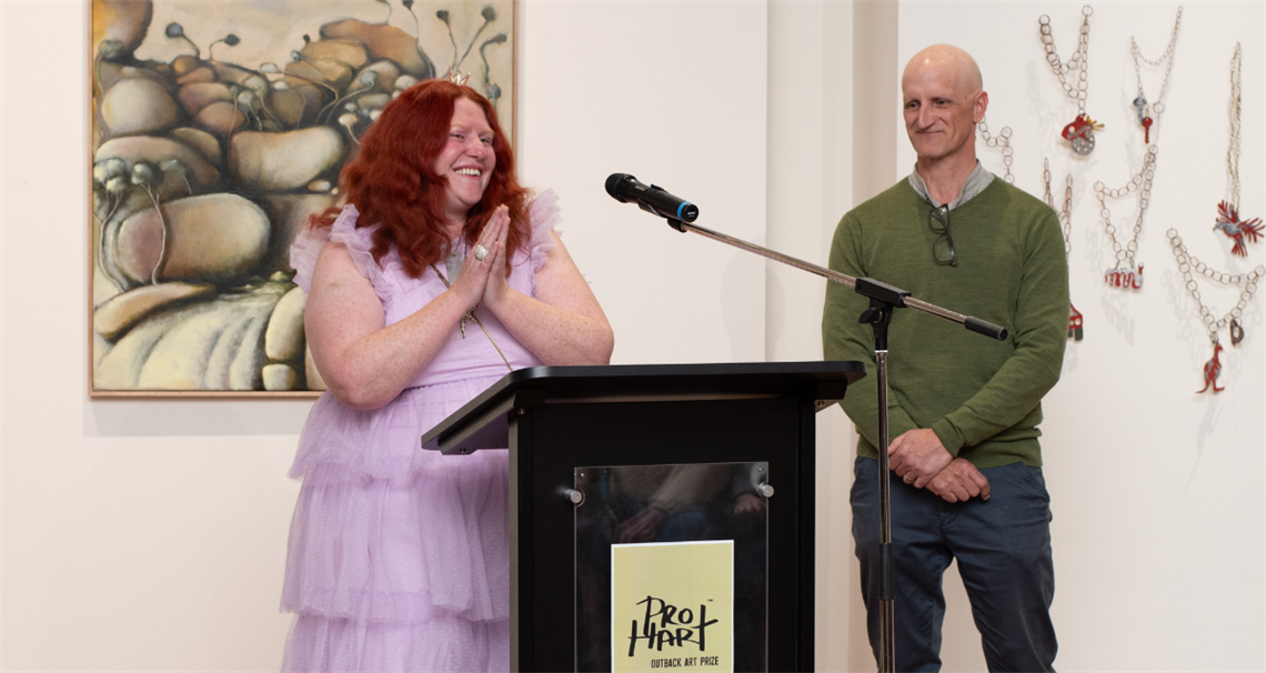 2025 pro hart outback art prize winner krystle evans with guest judge brett adlington