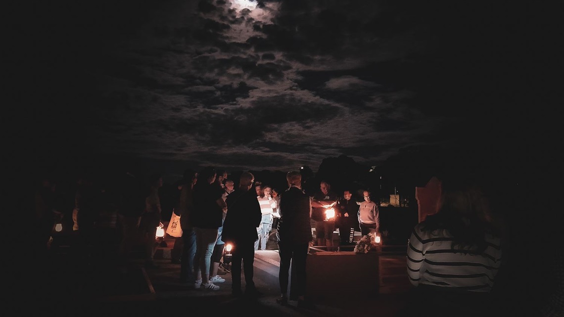 heritage festival cemetery tour at night time