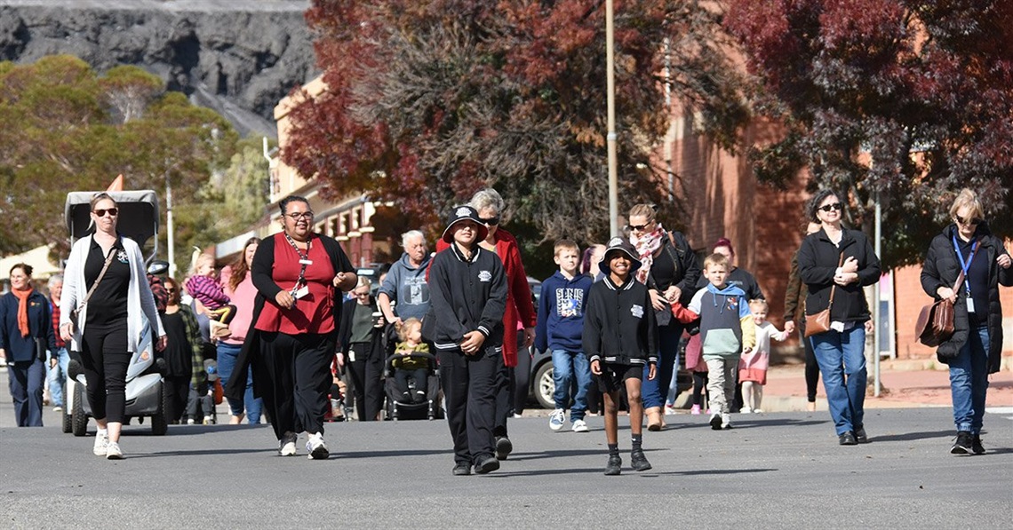 local school students and community members marching on solidarity at the 2022 reconciliation march