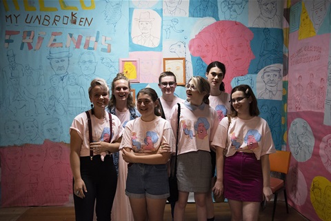 image of a group of art gallery work experience kids at an exhibition opening